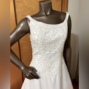 Beautiful vintage beaded ivory wedding gown.